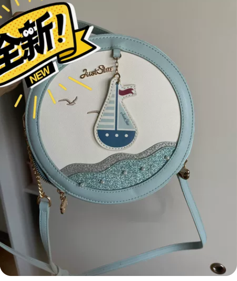 欧时纳九九成新蓝色海军风斜挎包 感兴趣的话...