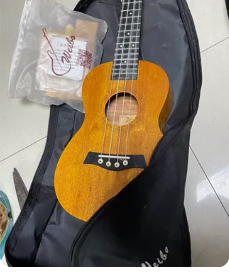 尤克里里。23寸。原色单琴防水包 感兴趣的...