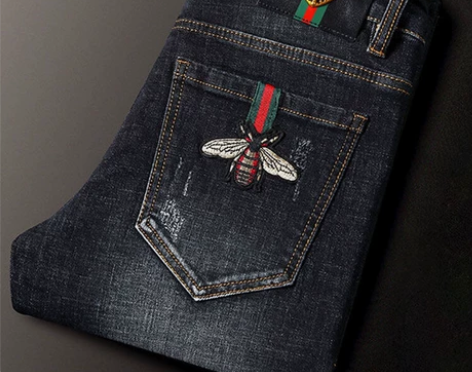 特价清仓秋季欧洲站男裤潮牌牛仔裤休闲个性小...