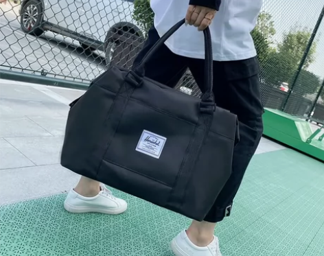 【清仓处理包邮】男女短途旅行包大容量便携手...