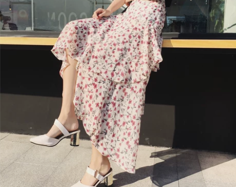 春夏中长裙女清新百搭不规则大摆裙显瘦碎花雪...