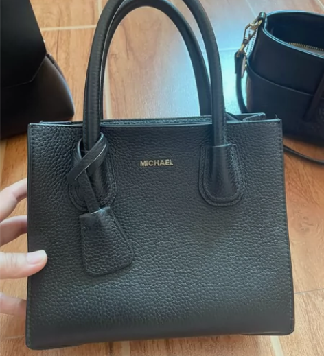 真皮包 手拿包 背带扔了 ，因为这种包必须...