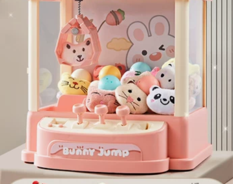 儿童抓娃娃机小型家用夹公仔机女童投币迷你扭...